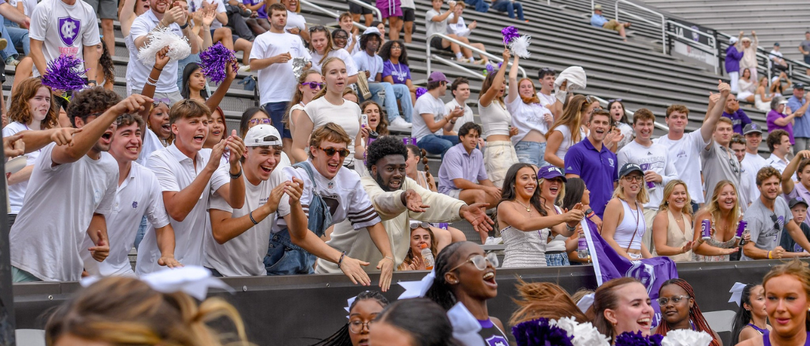 Students cheering at sporting event